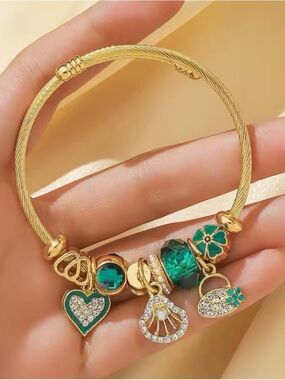 Gold-Tone Green Charm Bracelet with Crystal Accents